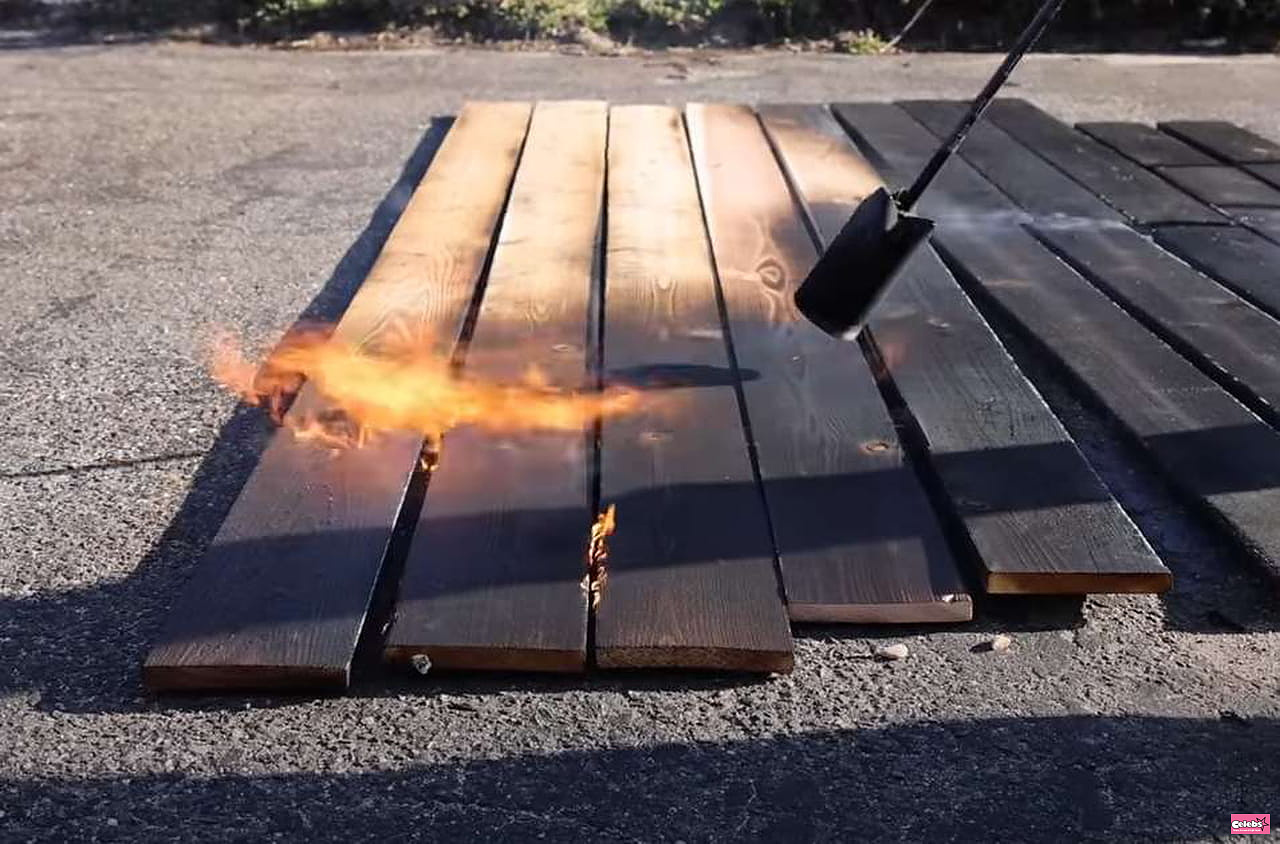 It burns the surface of flower bed boards - after seeing the result you will want to try it too
