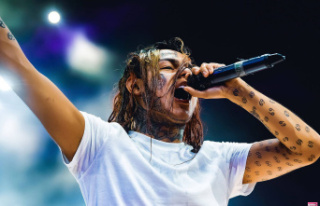 Rapper 6ix9ine Hospitalized After Assault: What We...